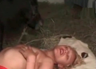 Blonde is having fun with a black mare